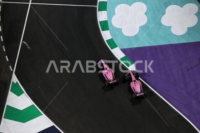 Jeddah, Saudi Arabia. 27th Mar, 2022. Fernando Alonso (ESP) Alpine F1 Team A522 and team mate Esteban Ocon (FRA) Alpine F1 Team A522 battle for position. Saudi Arabian Grand Prix, Sunday 27th March 2022. Jeddah, Saudi Arabia. Credit: James Moy/Alamy Live News