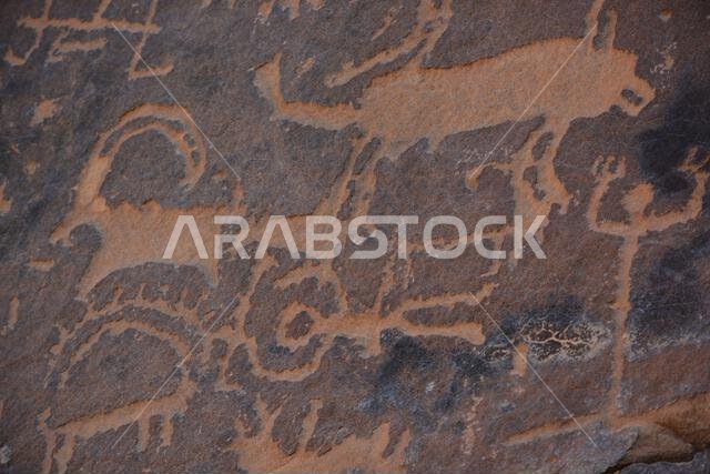 Ancient rock art from Saudi Arabia showing human and animals