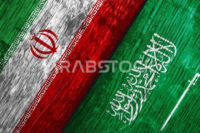 Flags of Iran and Saudi Arabia on the boards.