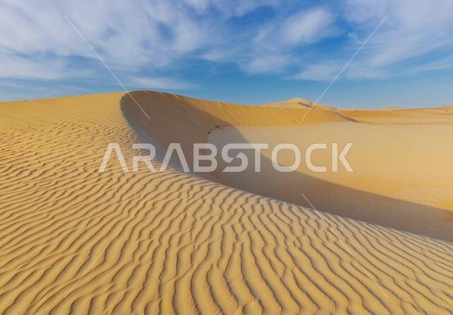 Dunes and colored sands of the Rub al-Khali desert