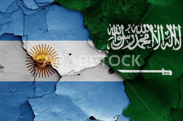 flags of Argentina and Saudi Arabia painted on cracked wall