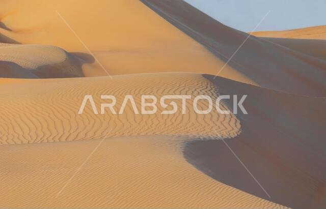 Dunes and colored sands of the Rub al-Khali desert