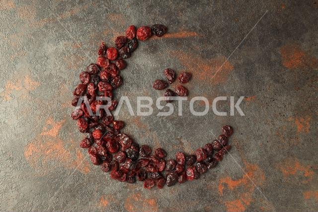 Concept of Ramadan Kareem food on dark textured background