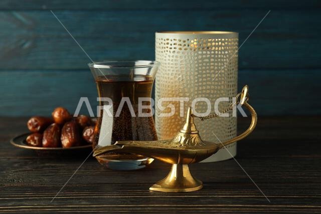Concept of Ramadan Kareem food on wooden table