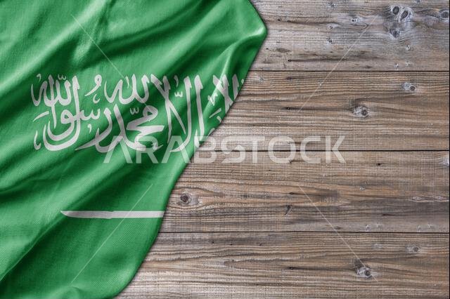 Wooden pattern old nature table board with Saudi Arabia flag