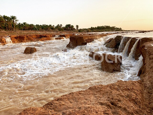 صورة ابداعية لشلال وادي الرمة بالعنيزة في القصيم بالمملكة العربية السعودية، شلال مياه، وادي الرمة، معالم مشهورة في السعودية، مناظر طبيعية خلابة، السياحة في السعودية