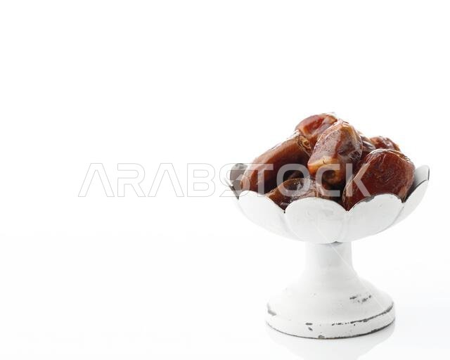 Kurma Sukari or Sukkari Dates is a kind of dates from middle east that usually eats during breakfasting in Ramadan. Copy Space for Text