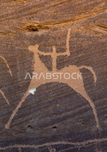 نقوش صخرية على صخرة تصور صيادًا على حصان، منطقة نجران، ثار، المملكة العربية السعودية