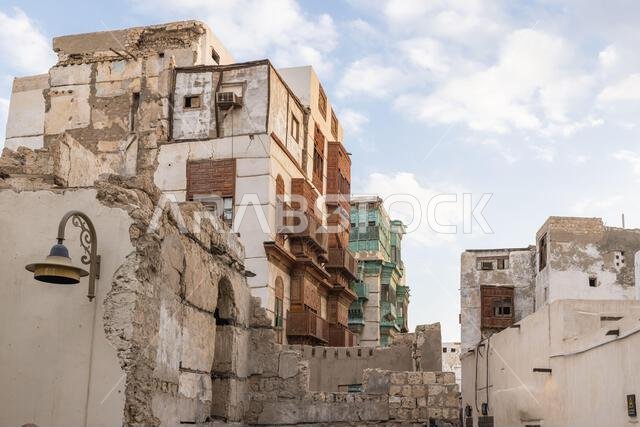 Middle East, Saudi Arabia, Mecca, Jeddah, Al-Balad. Traditional Hijazi tower house with wooden Rosan windows and balconies.