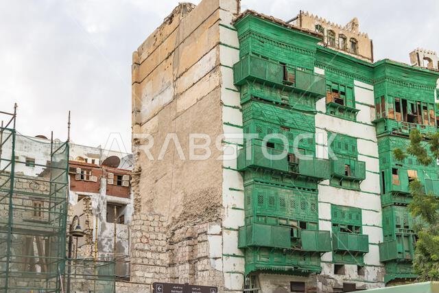 Middle East, Saudi Arabia, Mecca, Jeddah, Al-Balad. Traditional Hijazi tower house with wooden Rosan windows and balconies.