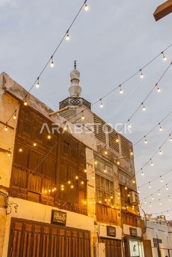 Middle East, Saudi Arabia, Mecca, Jeddah, Al-Balad. Lights strung across the street near the Al Shafei Mosque in the Al Balad historical district.