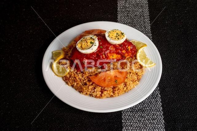 This dish is typical of Saudi Arabia and is eaten in all kinds of celebrations. The amount of different flavors in one bite is what makes it so wonder