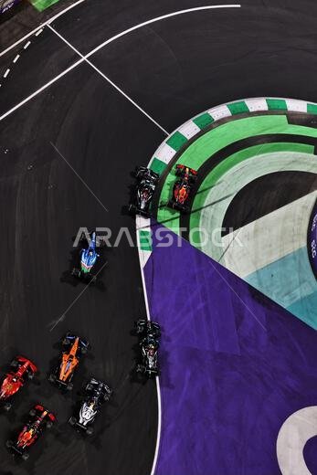 Max Verstappen (NLD) Red Bull Racing RB16B and Valtteri Bottas (FIN) Mercedes AMG F1 W12 battle for the lead of the race at the first restart. Saudi Arabian Grand Prix, Sunday 5th December 2021. Jeddah, Saudi Arabia.