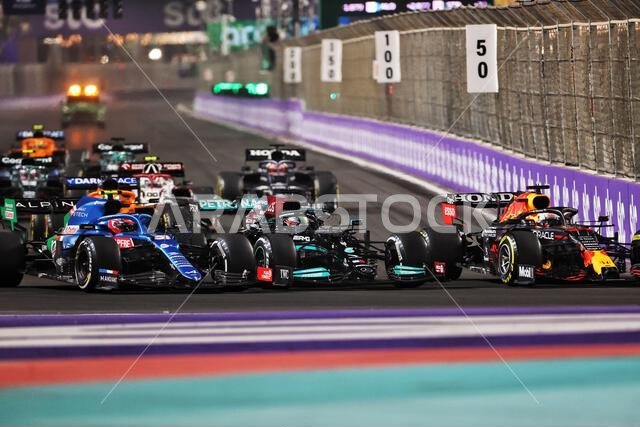 Jeddah, Saudi Arabia, 05/12/2021, (L to R): Esteban Ocon (FRA) Alpine F1 Team A521; Lewis Hamilton (GBR) Mercedes AMG F1 W12; and Max Verstappen (NLD) Red Bull Racing RB16B battle for the lead at the second race restart. 05.12.2021. Formula 1 World Championship, Rd 21, Saudi Arabian Grand Prix, Jeddah, Saudi Arabia, Race Day. Photo credit should read: XPB/Press Association Images. Jeddah, Saudi Arabia, 05/12/2021, (L to R): Esteban Ocon (FRA) Alpine F1 Team A521; Lewis Hamilton (GBR) Mercedes AMG F1 W12; and Max Verstappen (NLD) Red Bull Racing RB16B battle for the lead at the second race restart. 05.12.2021. Formula 1 World Championship, Rd 21, Saudi Arabian Grand Prix, Jeddah, Saudi Arabia, Race Day. Photo credit should read: XPB/Press Association Images.