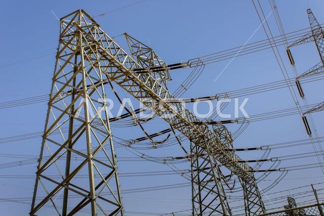 A high-voltage power line masts in Riyadh Province, Saudi Arabia