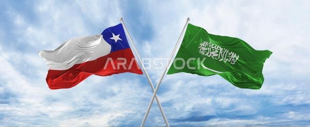 crossed national flags of Chile and Saudi Arabia flag waving in wind at cloudy sky. Symbolizing relationship, dialog, travelling between two countries