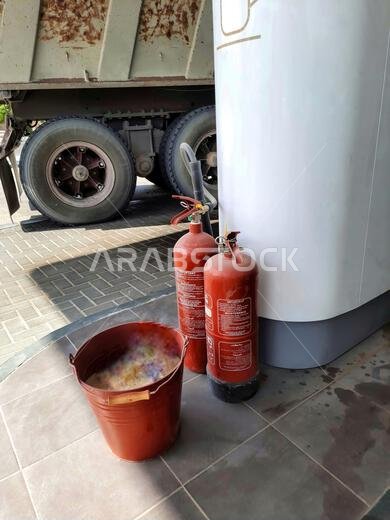 HOFUF AL HASA, SAUDI ARABIA - Sep 15, 2021: A safety cylinder for fire in the petrol pump