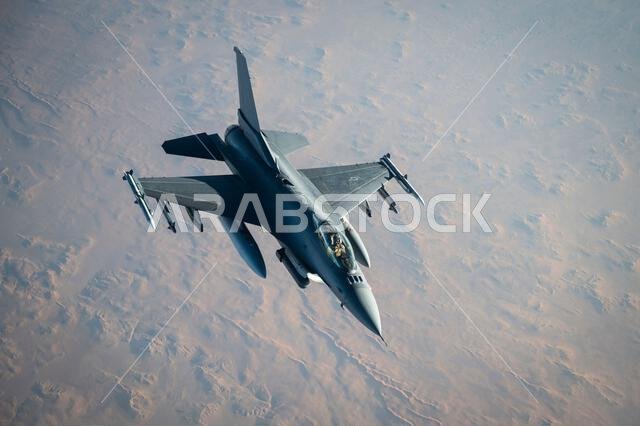 A U.S. Air Force F-16 Fighting Falcon flies above the Kingdom of Saudi Arabia, Nov. 6, 2021. The F-16 is a compact, multi-role fighter aircraft that delivers airpower and showcases U.S. Air Forces Central’s commitment to deterrence and stability in the U.S. Central Command area of responsibility. (U.S. Air Force photo by Staff Sgt. Joseph Pick) A U.S. Air Force F-16 Fighting Falcon flies above the Kingdom of Saudi Arabia, Nov. 6, 2021. The F-16 is a compact, multi-role fighter aircraft that delivers airpower and showcases U.S. Air Forces Central’s commitment to deterrence and stability in the U.S. Central Command area of responsibility. (U.S. Air Force photo by Staff Sgt. Joseph Pick)