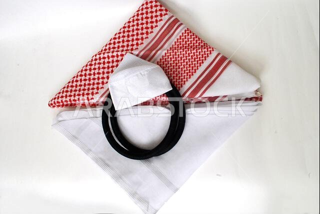 Arabic traditional clothing accessories Agal, Islamic cap and rosary,Shemagh with white Ghutrah isolated on white background