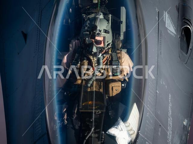 A U.S. Air Force F-16 Fighting Falcon pilot conducts aerial refueling with a U.S. Air Force KC-135 Stratotanker above the Kingdom of Saudi Arabia, Oct. 22, 2021. The F-16 is a compact, multi-role fighter aircraft that delivers war- winning airpower to the U.S. Central Command area of responsibility. (U.S. Air Force photo by Staff Sgt. Joseph Pick)