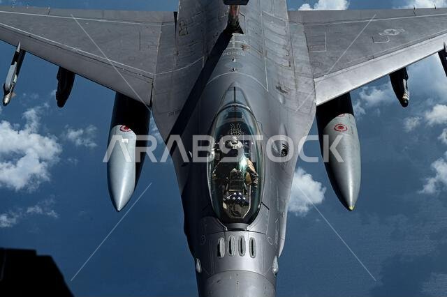 A U.S. Air Force F-16 Fighting Falcon connects with a USAF KC-10 Extender over the Red Sea, Nov. 11, 2021. The F-16 is a compact, multi-role fighter aircraft that delivers war-winning airpower to the U.S. Central Command area of responsibilty. (U.S. Air Force photo by Staff Sgt. Jerreht Harris) A U.S. Air Force F-16 Fighting Falcon connects with a USAF KC-10 Extender over the Red Sea, Nov. 11, 2021. The F-16 is a compact, multi-role fighter aircraft that delivers war-winning airpower to the U.S. Central Command area of responsibilty. (U.S. Air Force photo by Staff Sgt. Jerreht Harris)