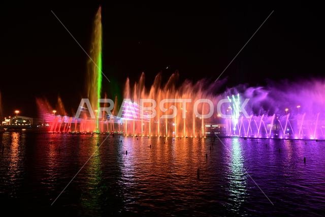 The colors are happy as they dance on the water of the dancing fountain in Riyadh Boulevard