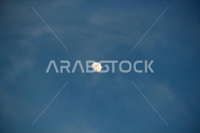 Colors the charming sky in the gentle summer، Mosque ،Saudi Arabia . orange sun blue