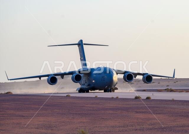 A U.S. Air Force C-17 Globemaster III lands on the runway at Prince Sultan Air Base, Kingdom of Saudi Arabia, prior to being loaded with cargo and personnel Aug. 18, 2021. The 378th Air Expeditionary Wing is providing air support, logistical capabilities, manpower and resources to U.S. Air Forces Central in support of non-combatant evacuation operations in Afghanistan. (U.S. Air Force photo by Senior Airman Samuel Earick)