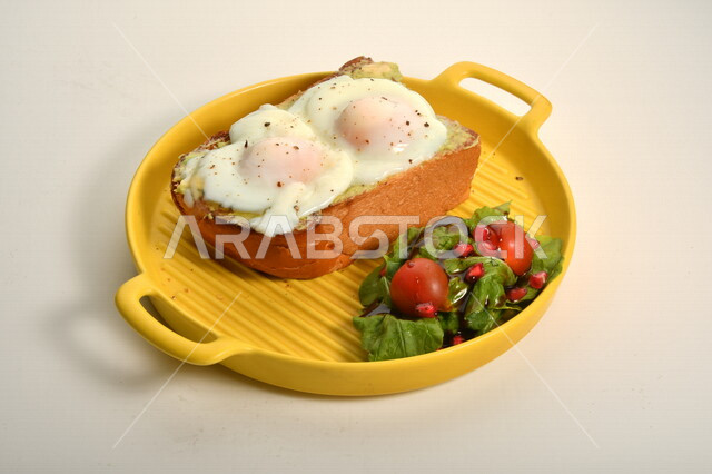 Close-up of a plate containing eggs with toast bread and vegetables, delicious fast food meals, Arabic restaurants, delicious food recipes, delicious food, healthy breakfast, restaurants for oriental Arabic food, white background