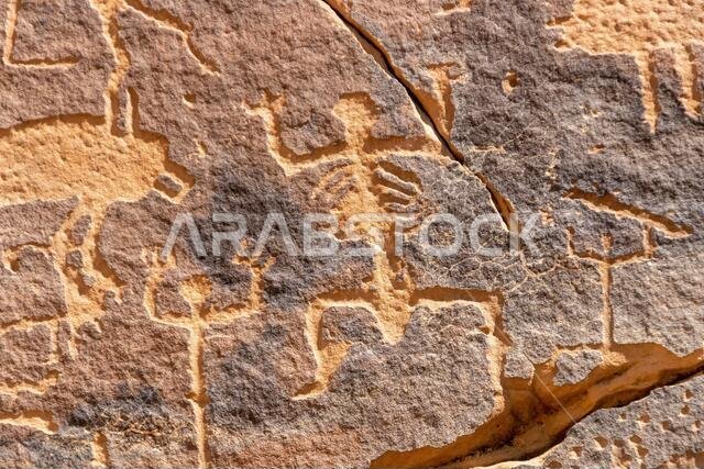 A petroglyphic image of humans with anatomical details, Graffiti Rocks (Qaryat al Asba), Musayqirah, Riyadh Province, Saudi Arabia