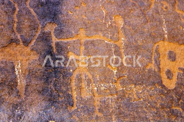 A petroglyphic image of a man holding tools, Graffiti Rocks (Qaryat al Asba), Musayqirah, Riyadh Province, Saudi Arabia
