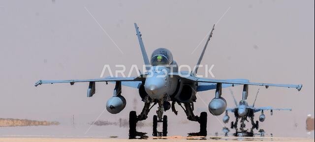 طائرتان من طراز F/A-18D هورنت تابعتان لسلاح مشاة البحرية الأمريكية تسيران على المدرج في قاعدة الأمير سلطان الجوية بالمملكة العربية السعودية، وذلك ضمن فعالية تدريب ميراج 3 الصحراوية في 18 مايو 2021. وكان هذا التدريب هو النسخة الثالثة من فعالية ثنائية تهدف إلى تعزيز قابلية التشغيل البيني وقدرات الدفاع الجوي بين القوات المشتركة وقوات الدول الشريكة.