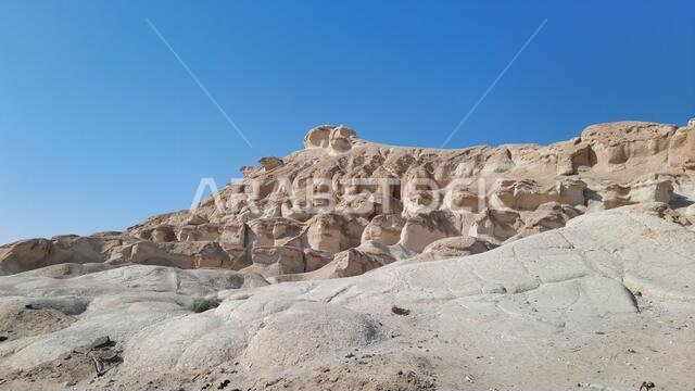 H, SAUDI ARABIA - Aug 20, 2021: The beautiful Al Qarah Mountains, in Al Hofuf, Saudi Arabia during daylight