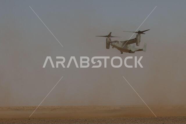 An MV-22 Osprey with Medium Tiltrotor Squadron 364, assigned to Special Purpose Marine Air-Ground Task Force – Crisis Response – Central Command, arrives at the site of a simulated crash during a Mass casualty drill in the Kingdom of Saudi Arabia, June 7, 2021. The drill required the Marines and Sailors to assess and treat multiple patients with a variety of simulated wounds, testing their ability to react in a timely manner to situations they might encounter in a combat environment. An MV-22 Osprey with Medium Tiltrotor Squadron 364, assigned to Special Purpose Marine Air-Ground Task Force – Crisis Response – Central Command, arrives at the site of a simulated crash during a Mass casualty drill in the Kingdom of Saudi Arabia, June 7, 2021. The drill required the Marines and Sailors to assess and treat multiple patients with a variety of simulated wounds, testing their ability to react in a timely manner to situations they might encounter in a combat environment.