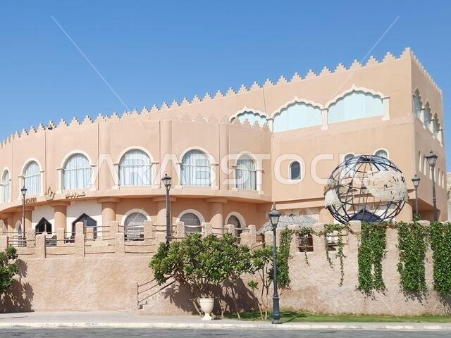 HOFUF AL HASA, SAUDI ARABIA - Aug 20, 2021: The hotels near Al Qarah Mountains, in Al Hofuf, Saudi Arabia during daylight