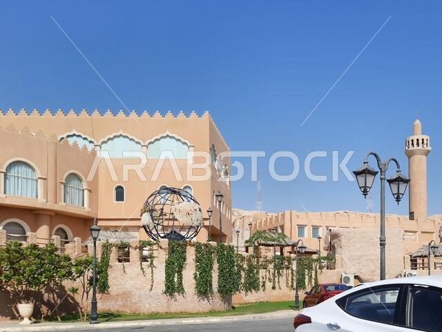 HOFUF AL HASA, SAUDI ARABIA - Aug 20, 2021: The hotels near Al Qarah Mountains, in Al Hofuf, Saudi Arabia during daylight