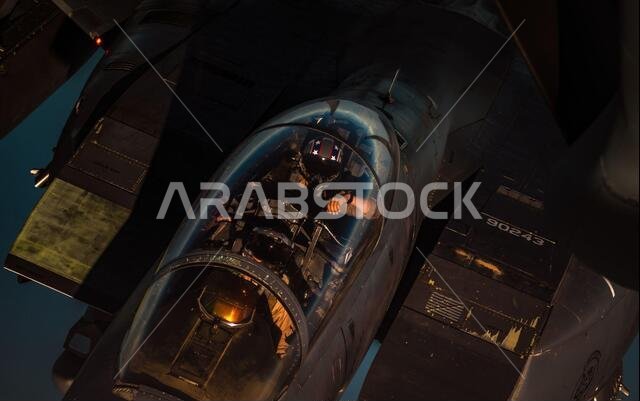 A U.S. Air Force F-15E Strike Eagle aircraft receives fuel from a U.S. Air Force KC-135 Stratotanker aircraft, assigned to the 350th Expeditionary Air Refueling Squadron, during a mission supporting a five-day Air Forces Central Agile Combat Employment Capstone Event in Saudi Arabia, March 4, 2021. AFCENTs Agile Capstone Event enhances theater airpower competencies, validating operational capabilities and command and control while simultaneously strengthening regional partnerships.
