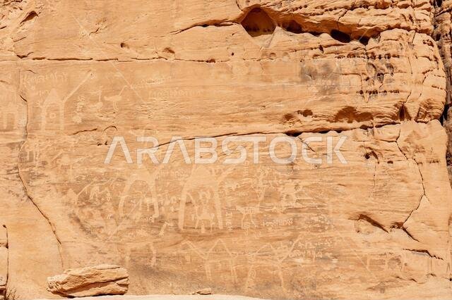 Ancient rock carvings petroglyphs in the desert near Medina in Saudi Arabia