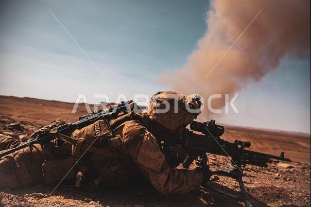 210619-M-TU241-1005 TABUK, Saudi Arabia (June 19, 2021) - A Marine assigned to the 24th Marine Expeditionary Unit (MEU) fires an M240B machine gun as part of live-fire training during a theater amphibious combat rehearsal (TACR) at Tabuk, Kingdom of Saudi Arabia, June 19. TACR integrates U.S. Navy and Marine Corps assets to exercise a range of critical combat-related capabilities, both afloat and ashore. 24th MEU is deployed to the U.S. 5th Fleet area of operations in support of naval operations