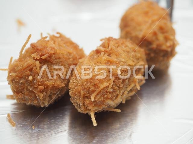 Chicken chop, Kerala South India. hot and spicy tea time snack on metal plate, plate background