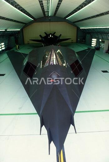 U.S. Air Force F-117A Nighthawk stealth fighter aircraft parked inside a hangar during Operation Desert Shield at King Khalid Air Base January 2, 1991 in Khamis Mushait, Saudi Arabia.