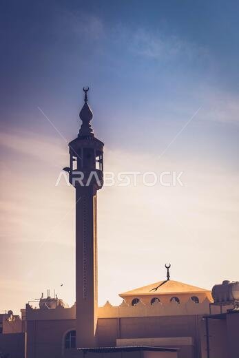 masjid minarets against sky background