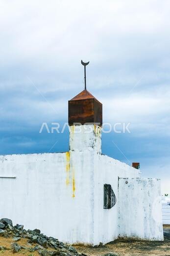 masjid minarets against sky background
