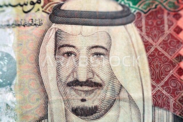 Portrait of king Salman Bin Abdulaziz Al Saud, the king of Saudi Arabia kingdom from the obverse side of 100 one hundred Saudi riyal bill banknote mon