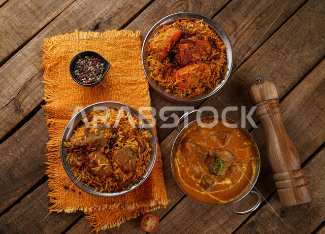 طبق من أرز البرياني اللذيذ مع اللحم، أرز مبهر، طبق مسالا هندي، أكلات عربية تقليدية، مأكولات عربية، أطباق شعبية، وصفات وأطباق طعام لذيذة، وجبات الطعام الصحية الشهية، مطاعم شرقية، مطاعم للمأكولات العربية الشرقية