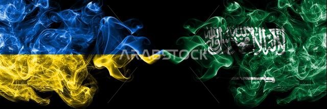 Ukraine, Ukrainian vs Saudi Arabia, Arabian smoky mystic flags placed side by side. Thick colored silky abstract smokes flags.