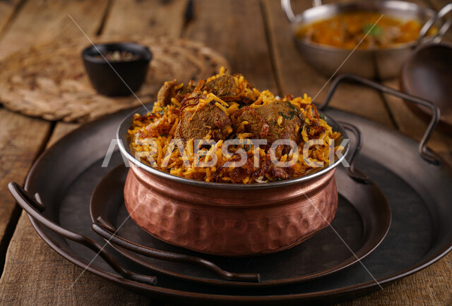 A plate of delicious biryani rice with meat, dazzling rice, traditional Arab dishes, Arab food, traditional dishes, delicious recipes and food dishes, delicious healthy meals, oriental restaurants, restaurants for oriental Arab food