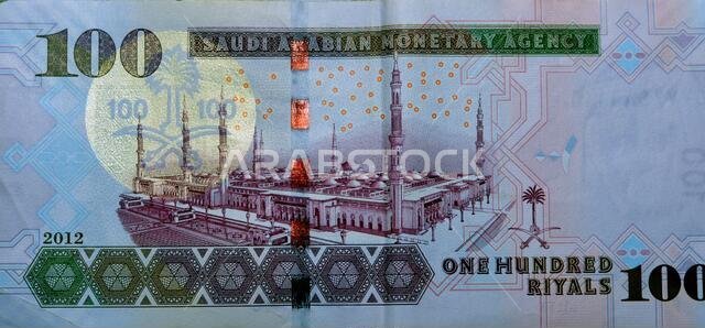 ورقة نقدية من فئة 100 ريال سعودي، إصدار 2009. الريال السعودي هو عملة المملكة العربية السعودية، ويحظى باهتمام خاص من المملكة. ورقة نقدية من فئة 100 ريال سعودي، إصدار 2009. الريال السعودي هو عملة المملكة العربية السعودية، ويحظى باهتمام خاص من المملكة.