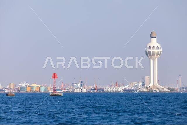 Port of Jeddah, Saudi Arabia. Skyline with white traffic control tower and red navigation mark