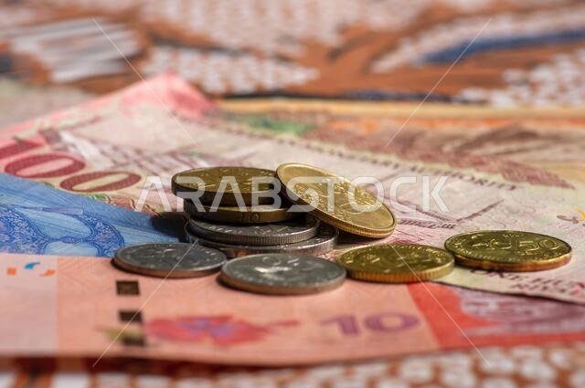 Money, Banknote of Ringgit Malaysia, Singapore dollar and Saudi Arabia Riyals for background, selected focus. Business, Finance, Economy and Investmen